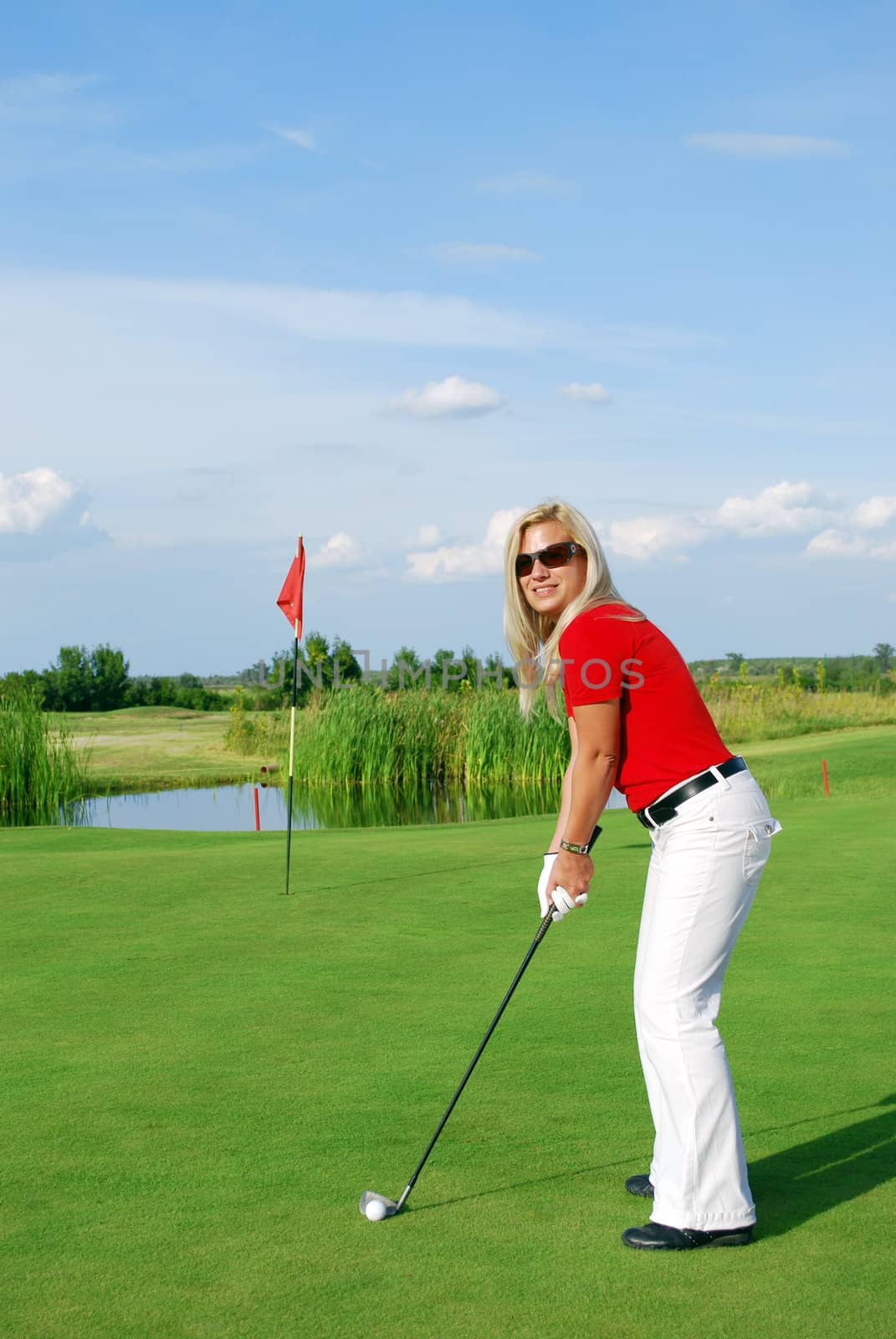 Beauty blonde girl golf player