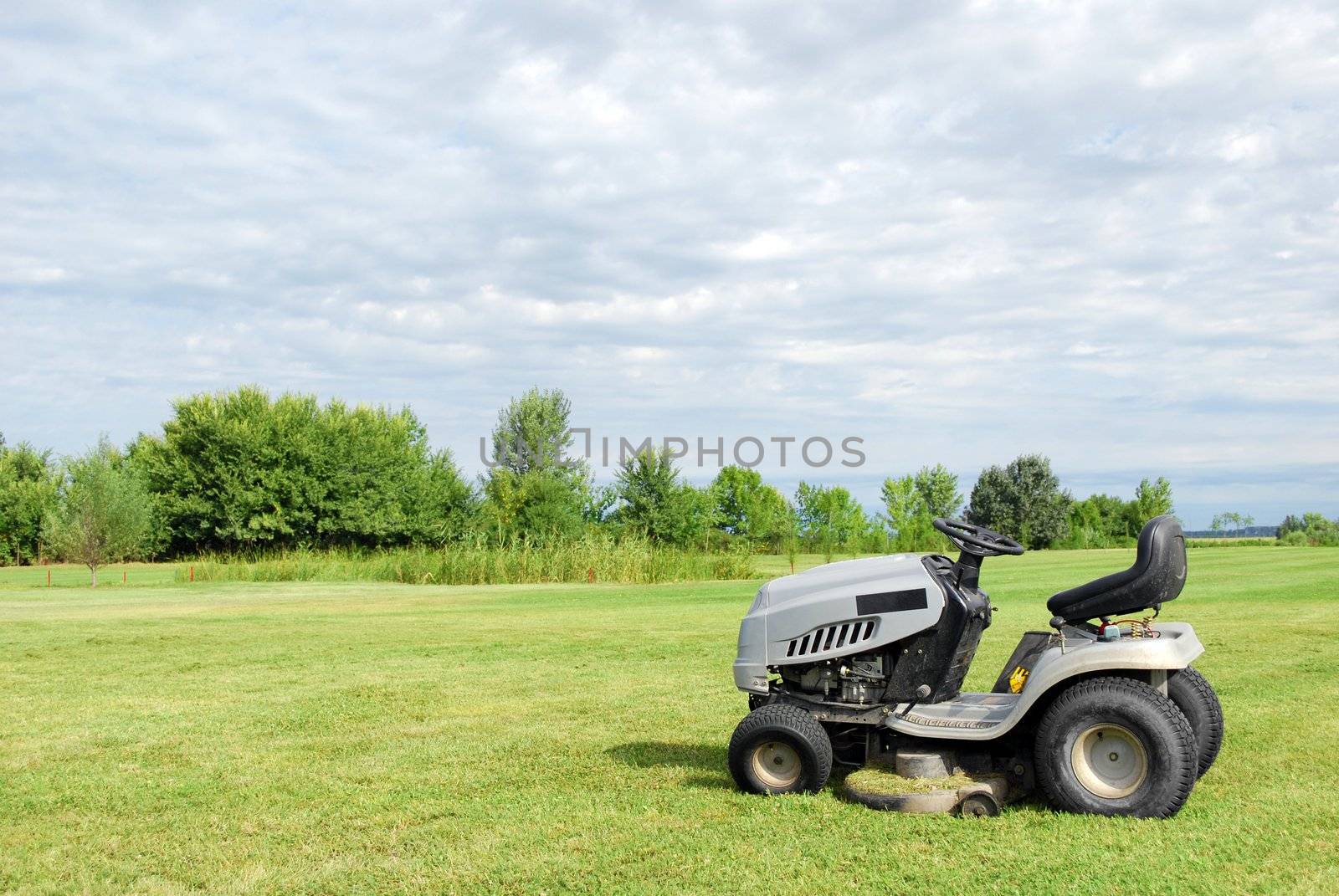 Lawn with riding lawn mower