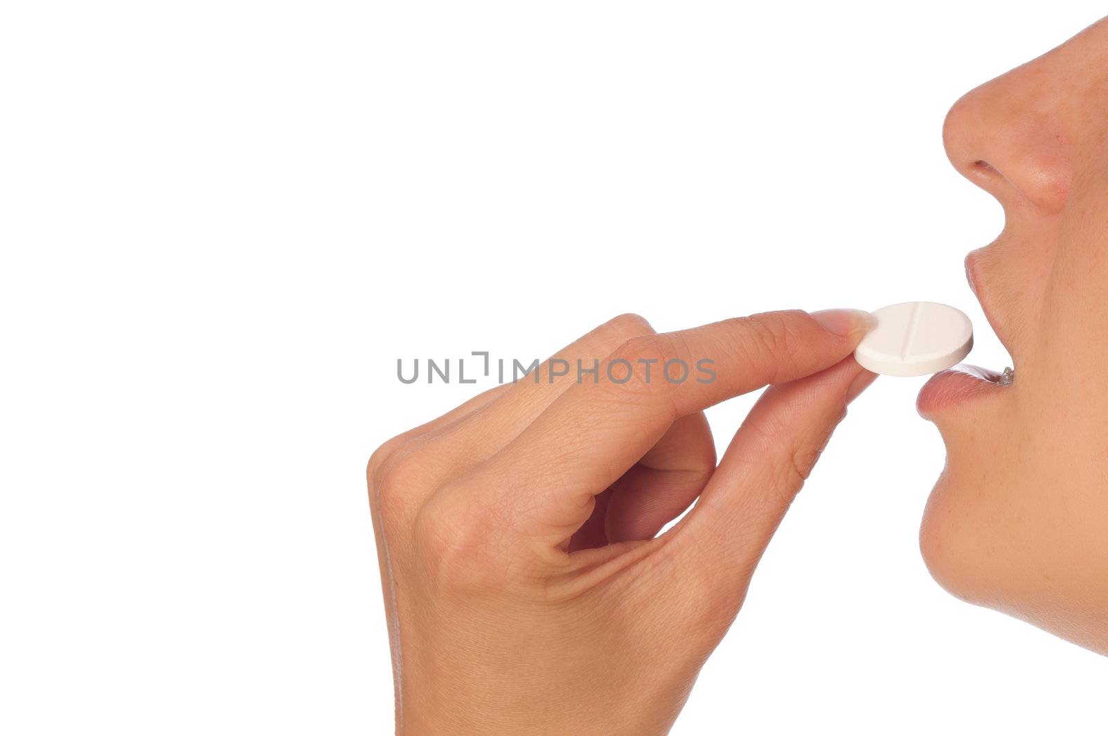 woman taking narcotic in a shape of white pill