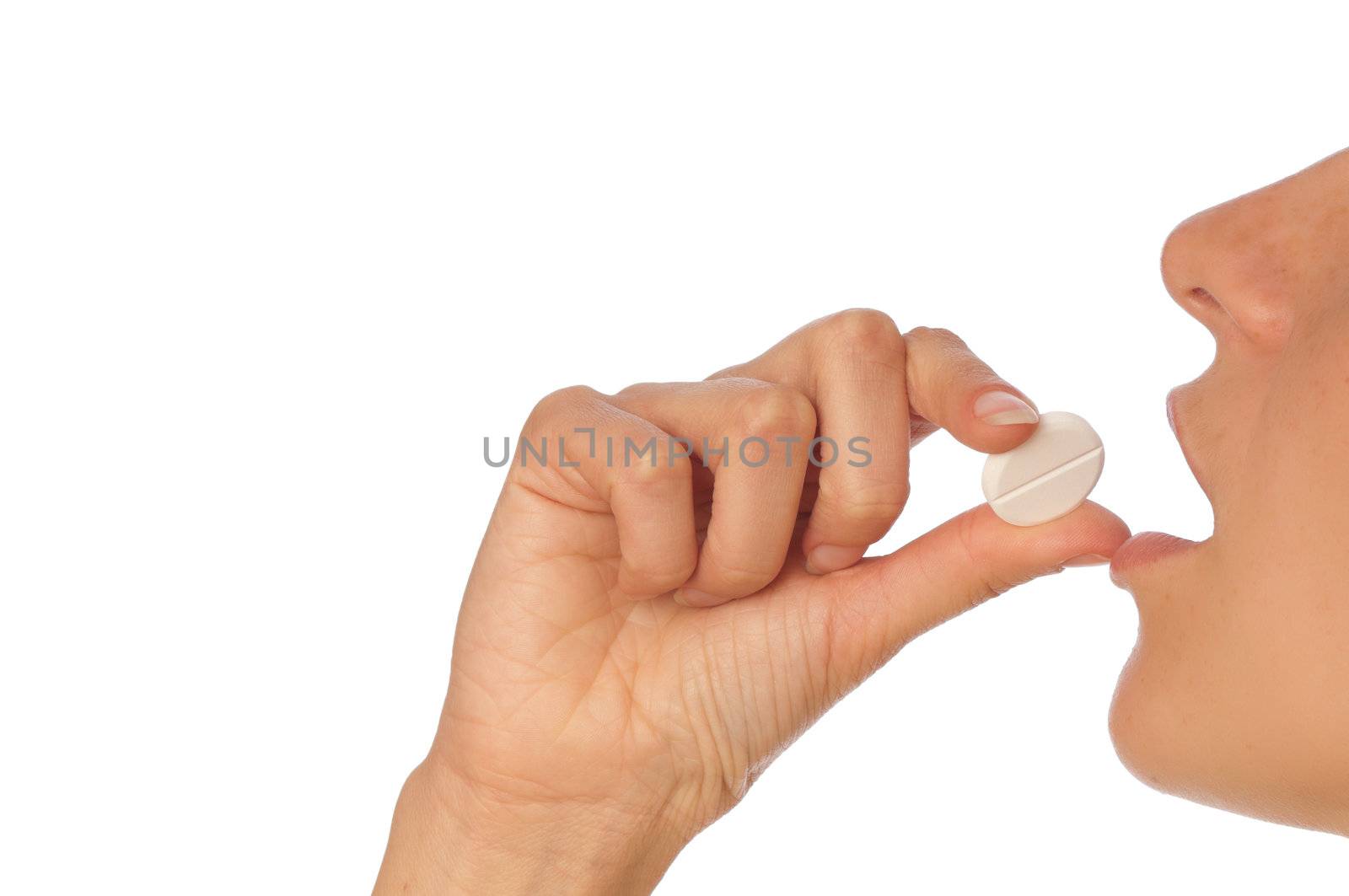 woman taking narcotic in a shape of white pill