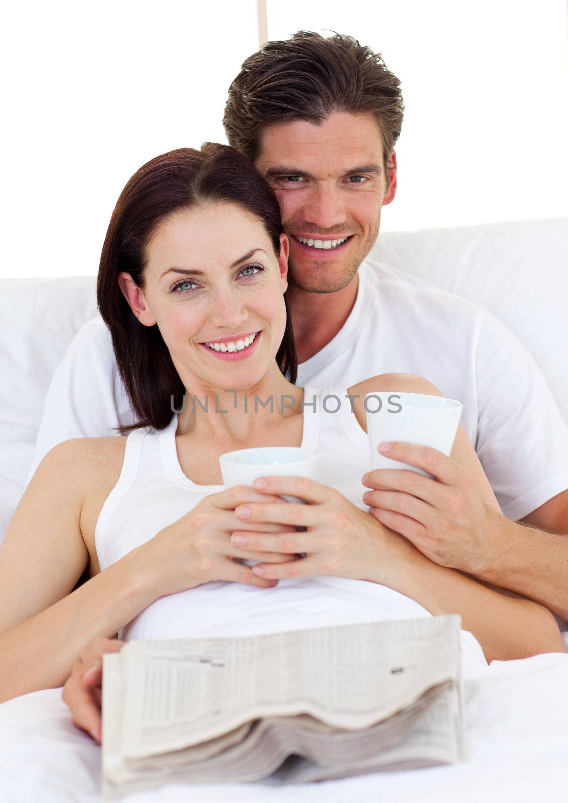 Romantic couple drinking coffee by Wavebreakmedia