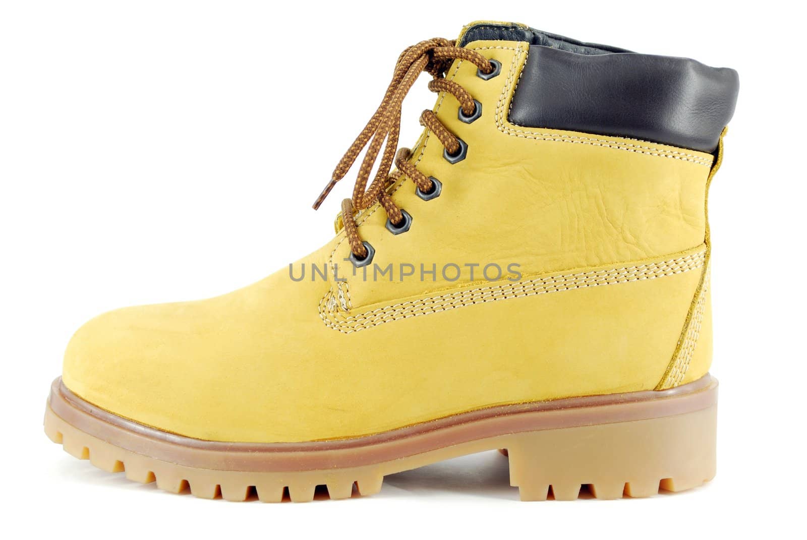 Yellow hiking boot on white