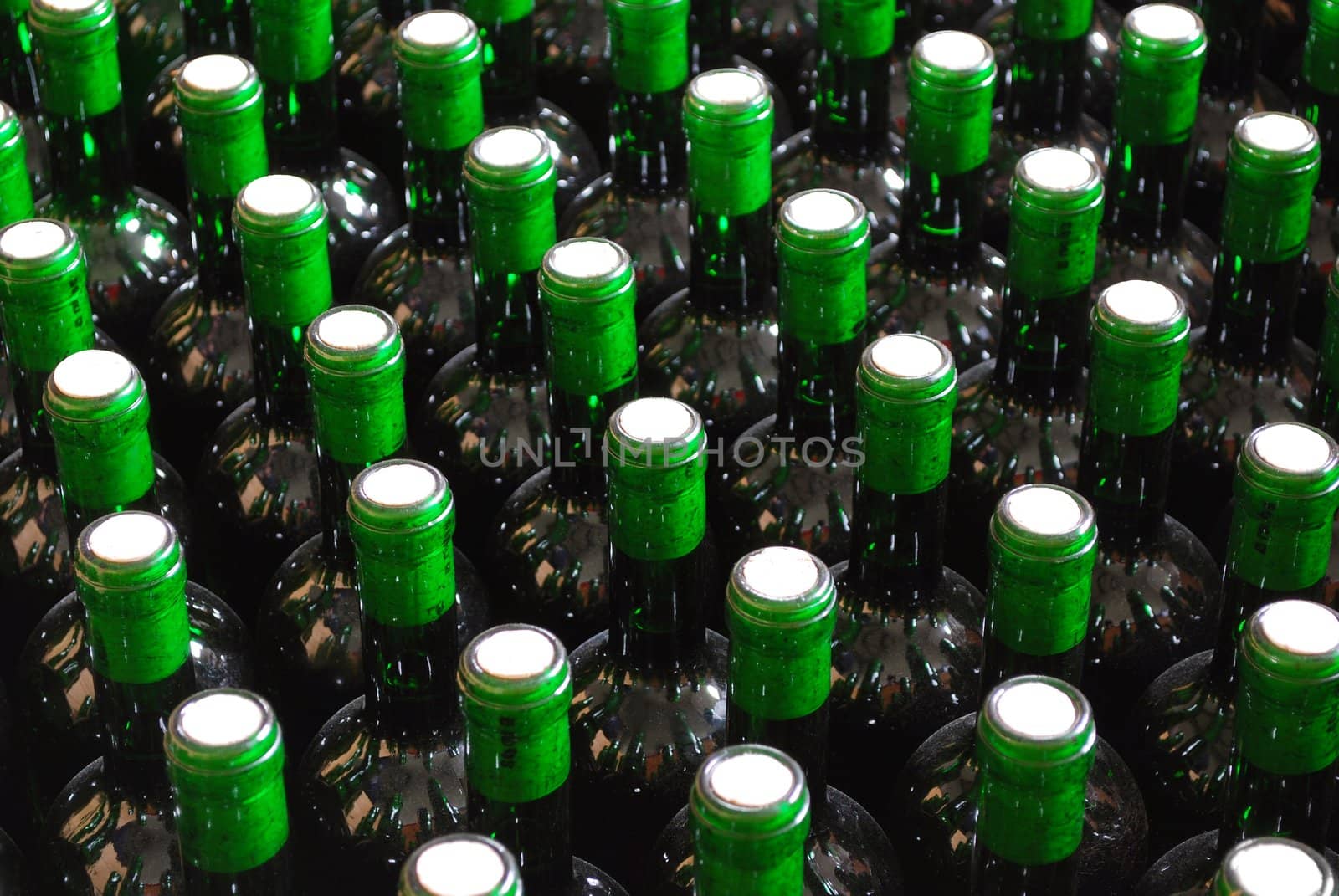 Red wine bottles rows background