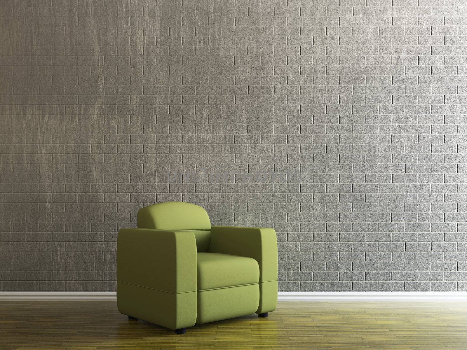 Green armchair near the brick wall