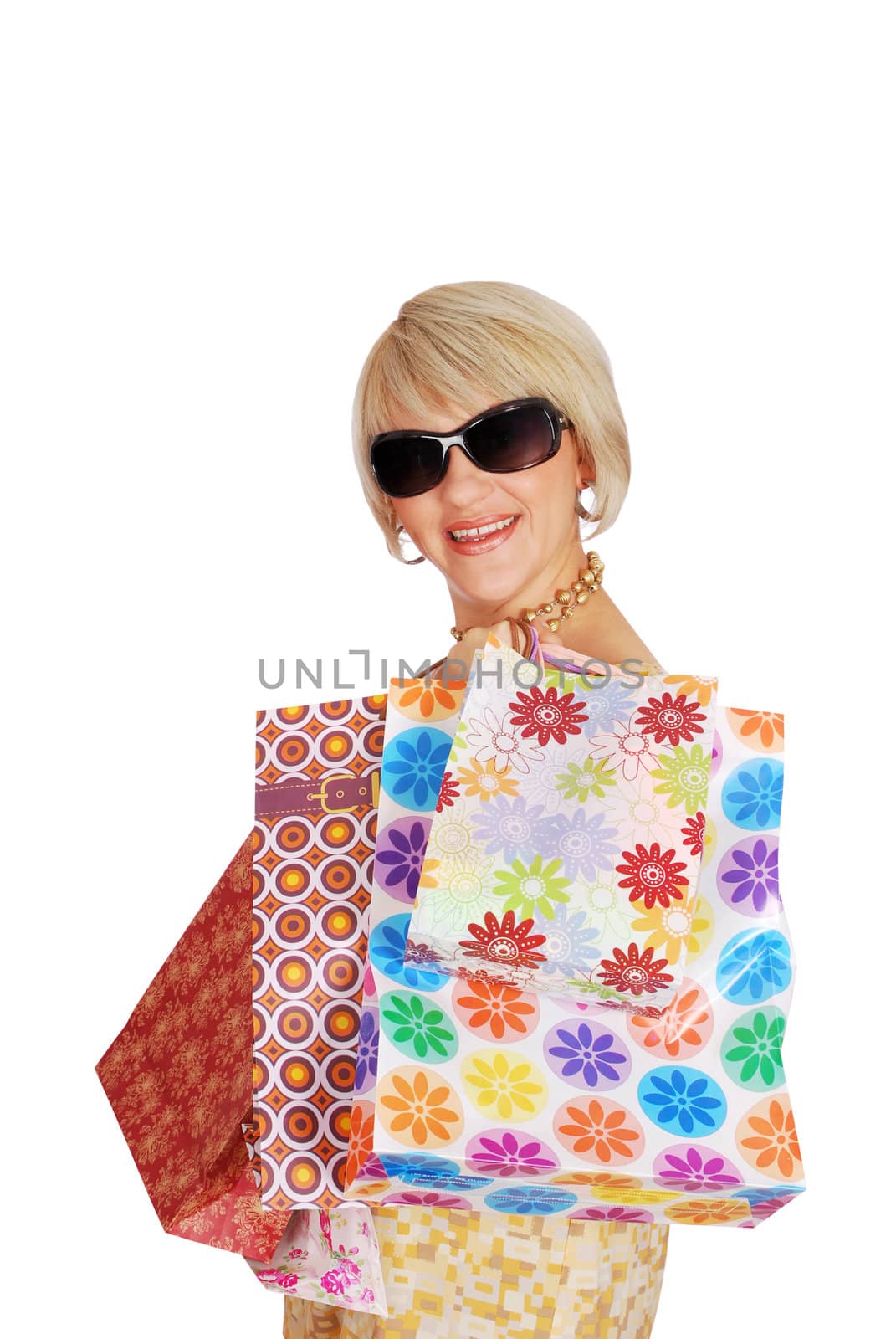 Woman with shopping bags and sunglasses studio shot