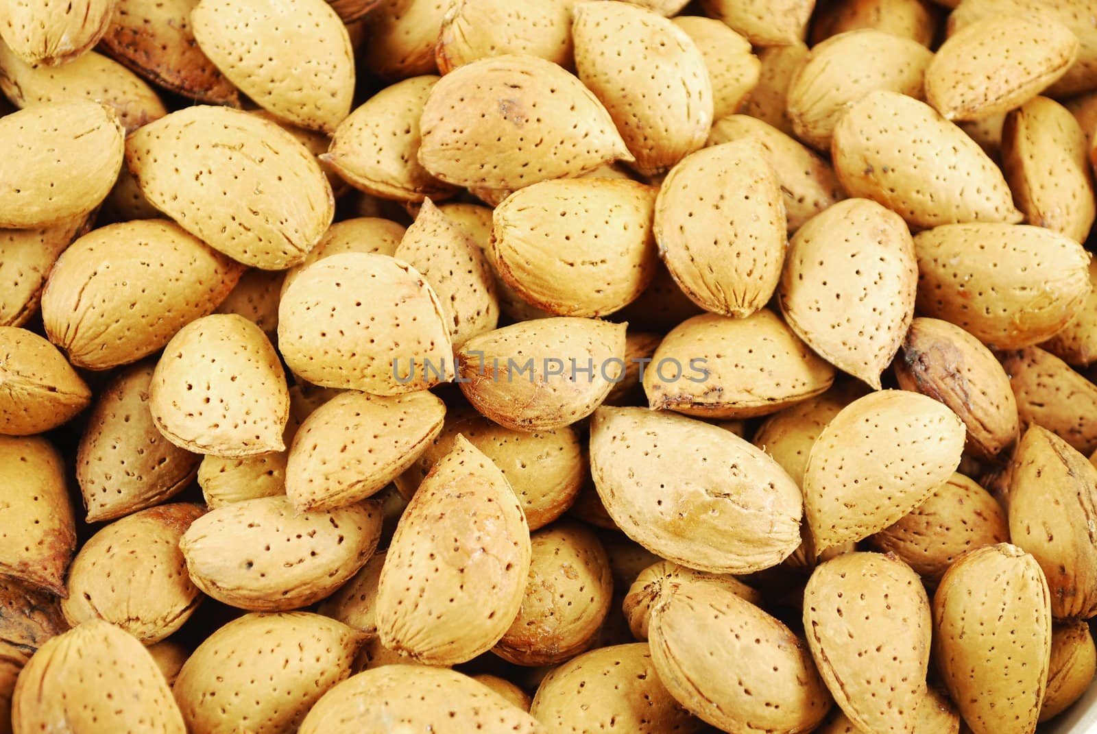 Raw food almond background closeup