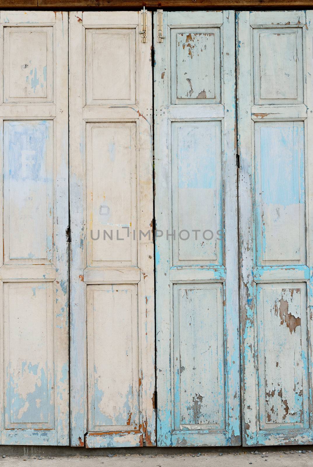 The Thai style vintage wooden door.