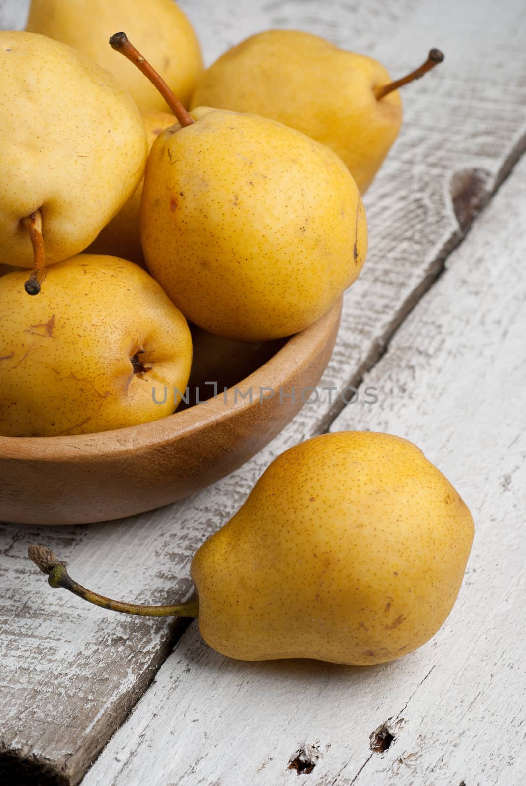 Yellow Sweet Pears in a Bowl by GennadiyShel