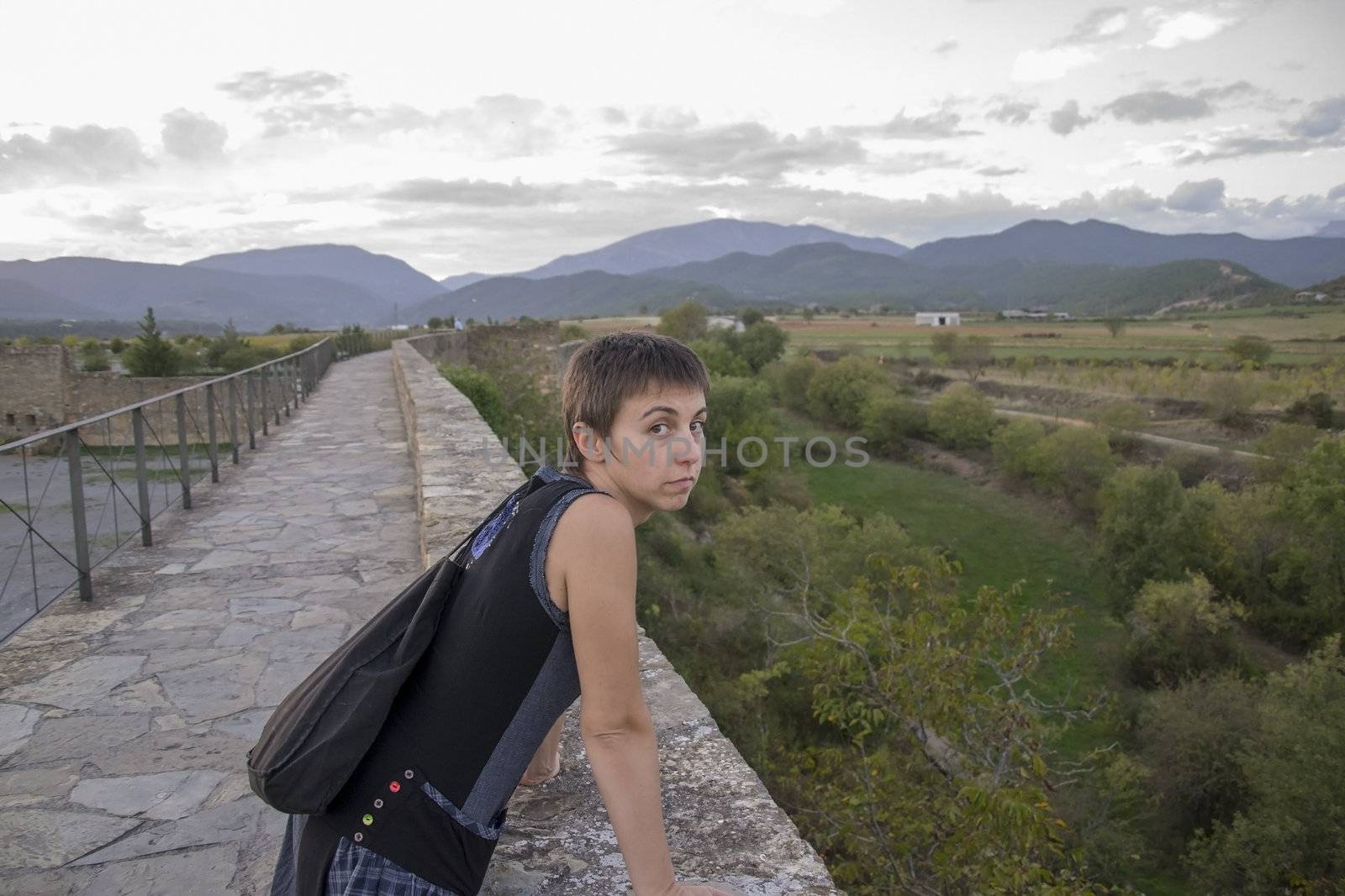 Carol model in a stone wall in the castle of Ainsa (Spain)