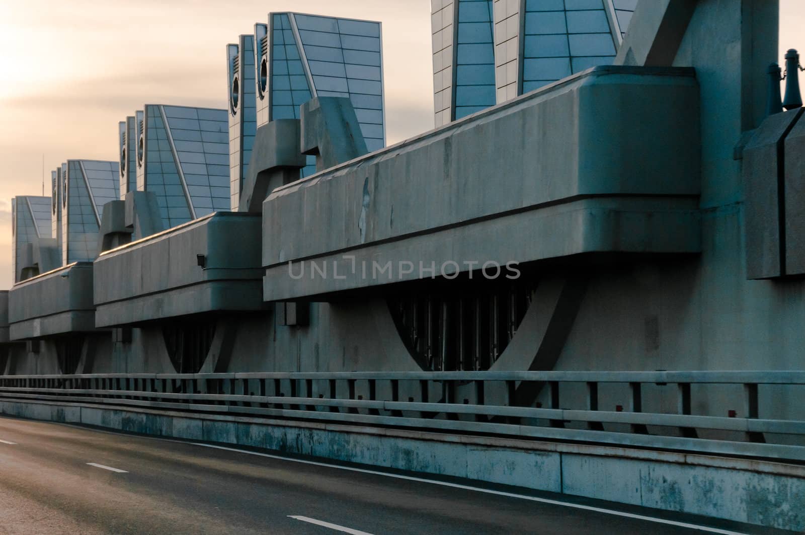 Dam with road at dusk time by dmitryelagin