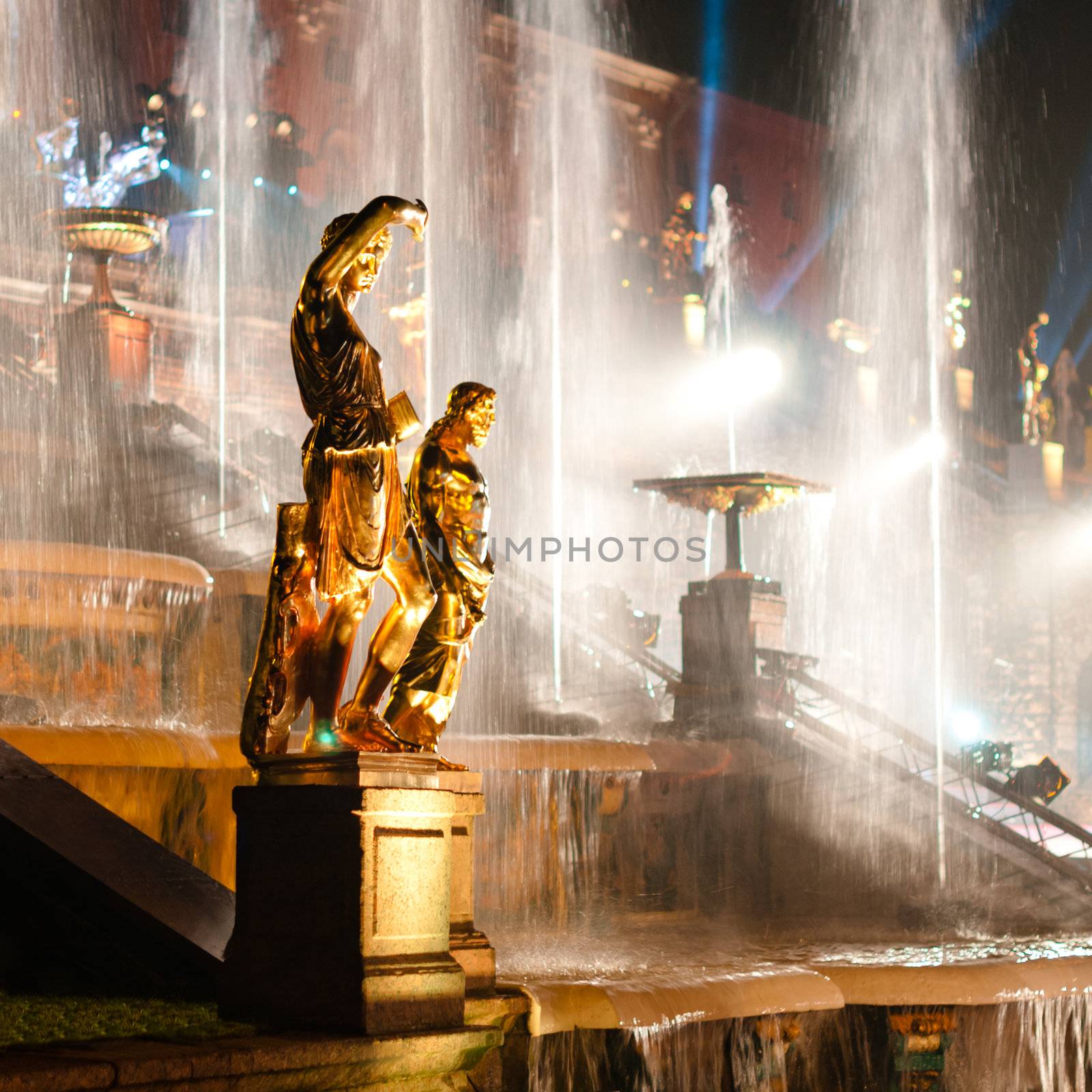 Sculptures with fountain on background by dmitryelagin