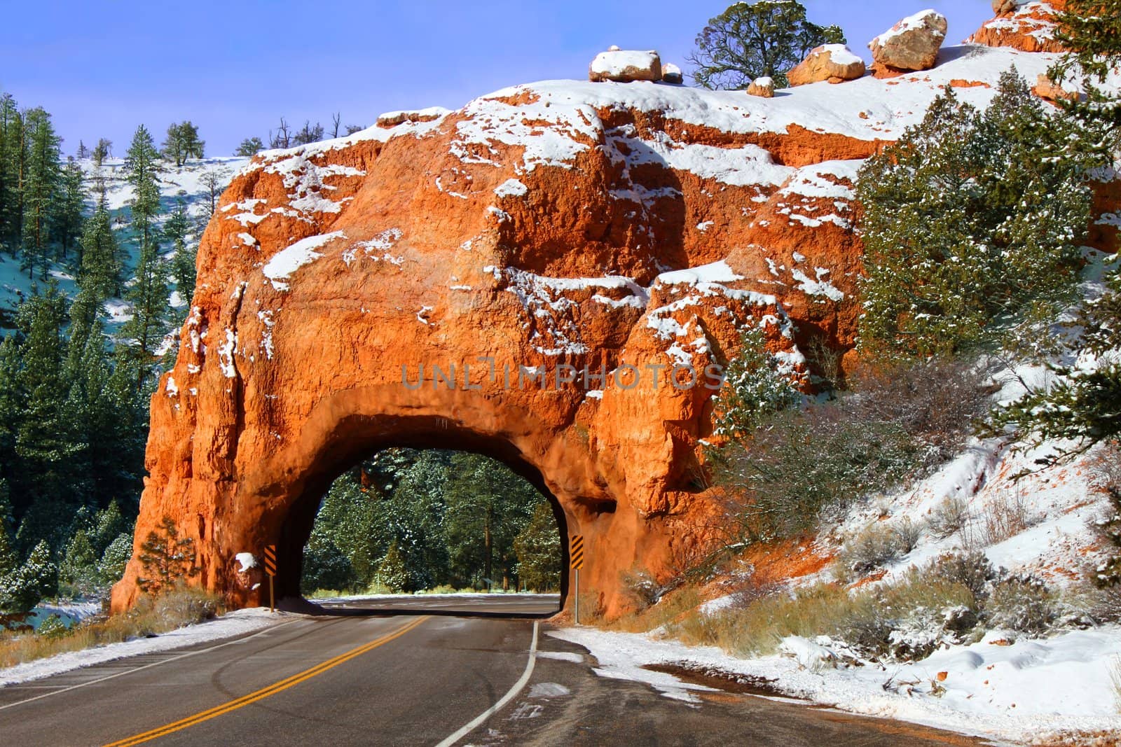 Rock Tunnel through the Red Canyon of Dixie National Forest in Utah.