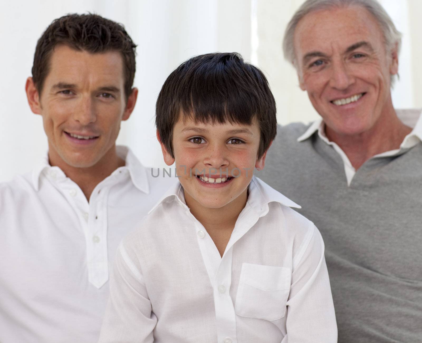 Smiling son, father and grandfather by Wavebreakmedia