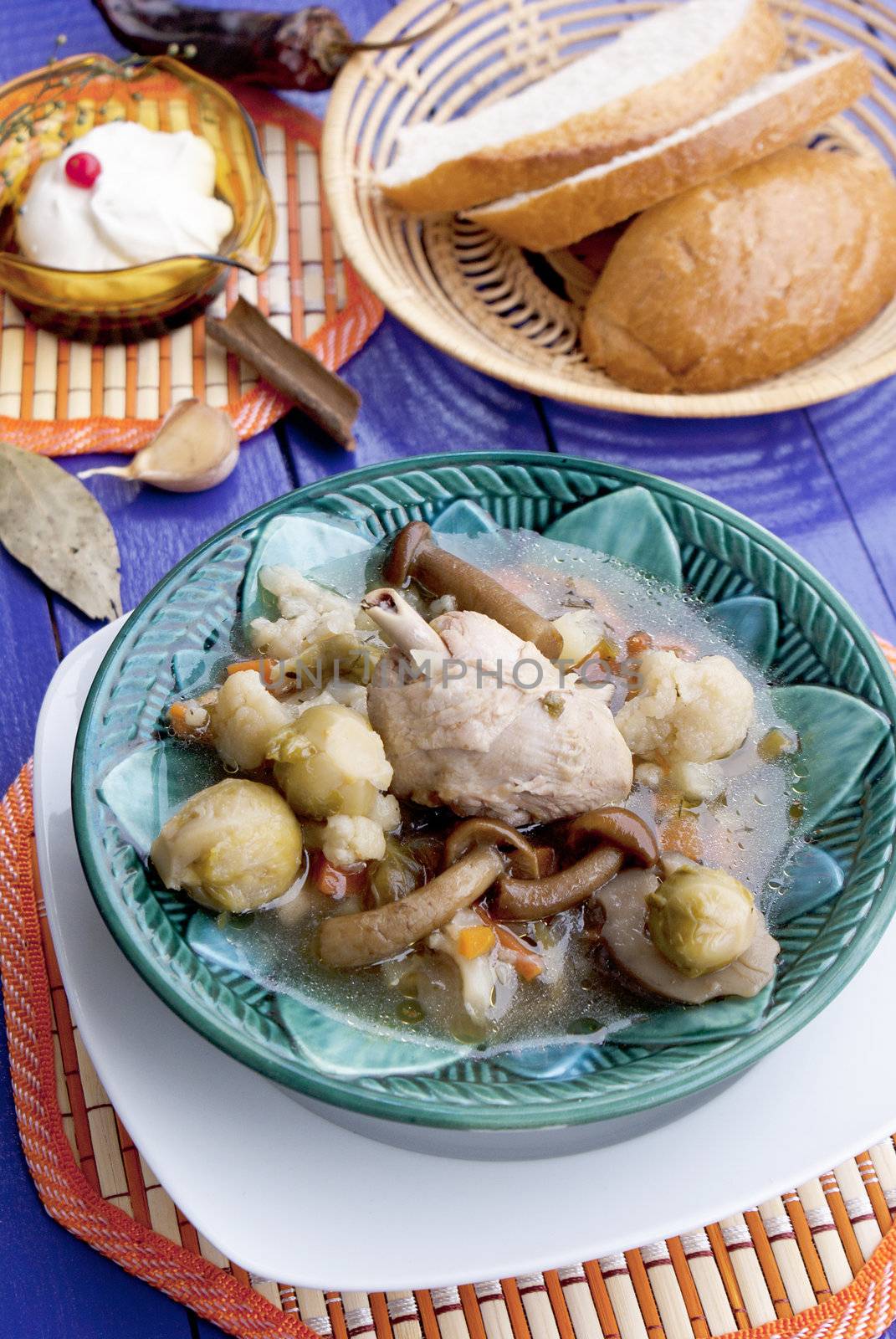 Chicken vegetables soup with fungi