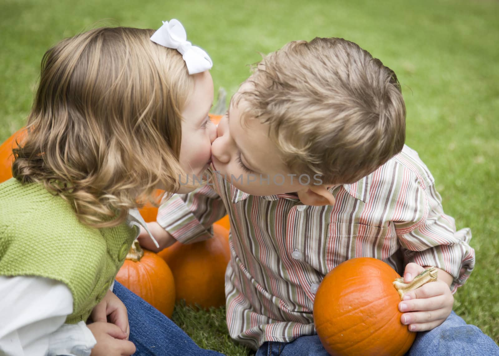 Cute Young Brother and Sister Kiss At the Pumpkin Patch by Feverpitched