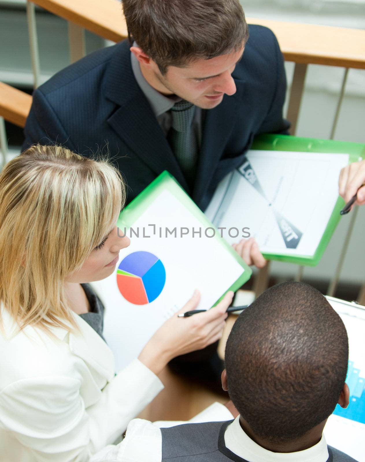 Young business people working on stairs