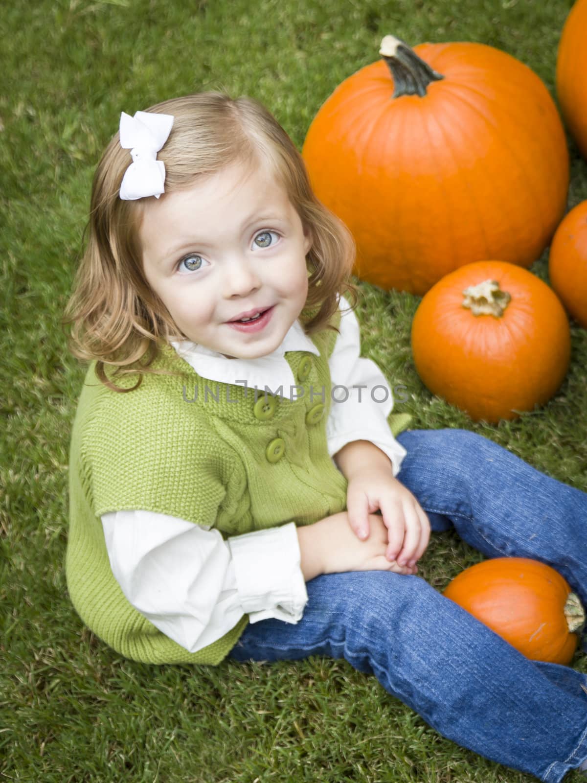 Cute Young Child Girl Enjoying the Pumpkin Patch. by Feverpitched