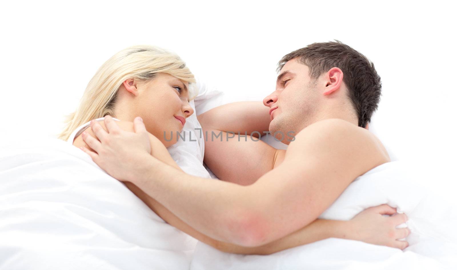loving young Couple relaxing on bed 