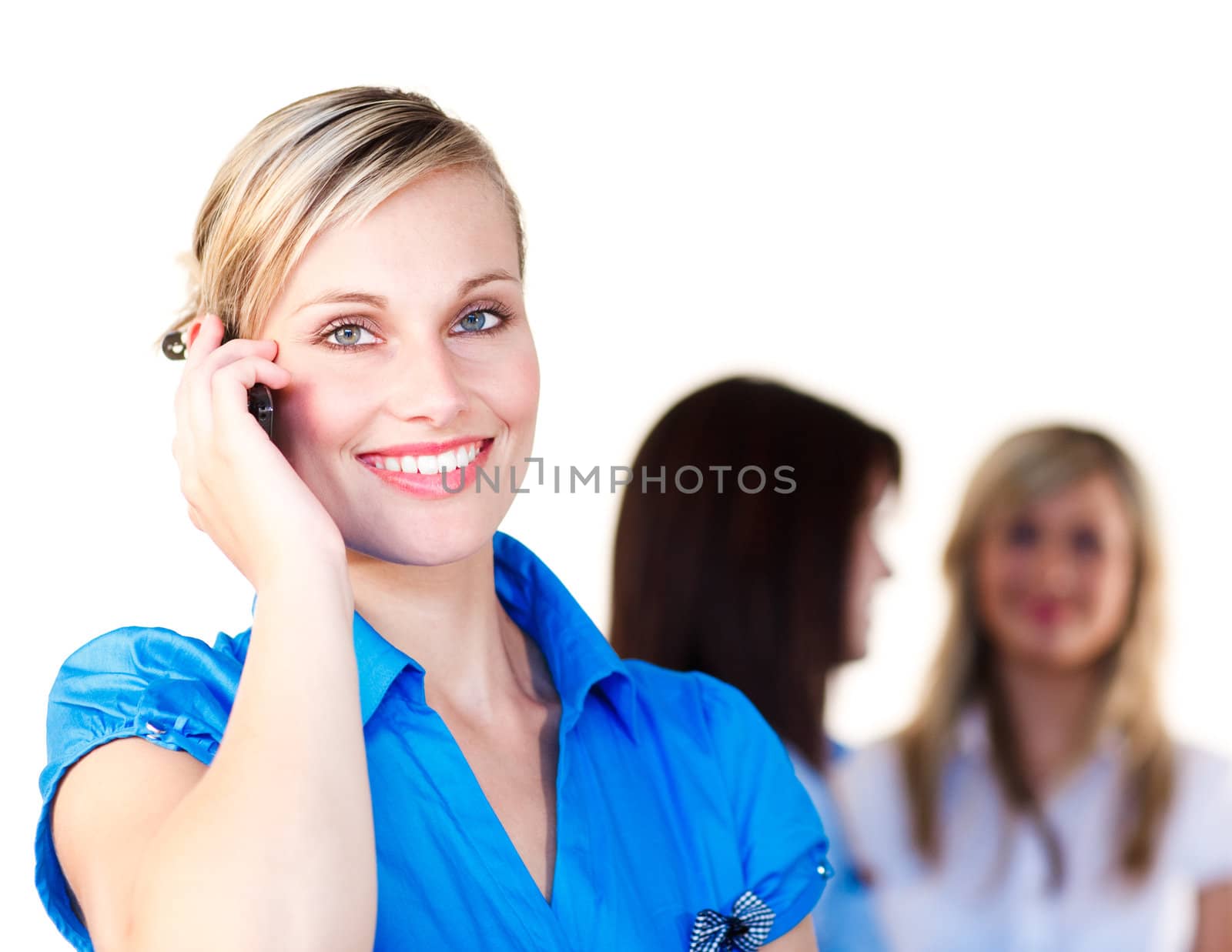 Smiling businesswoman speaking on the phone in office by Wavebreakmedia