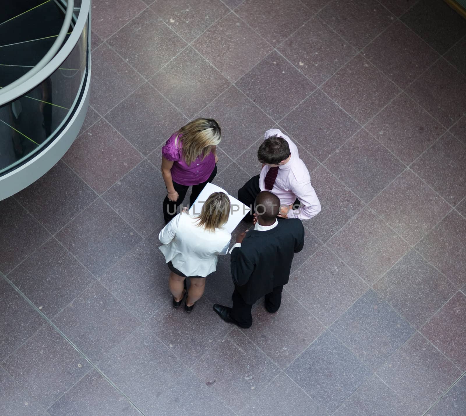 High angle of businessteam interacting with each other by Wavebreakmedia