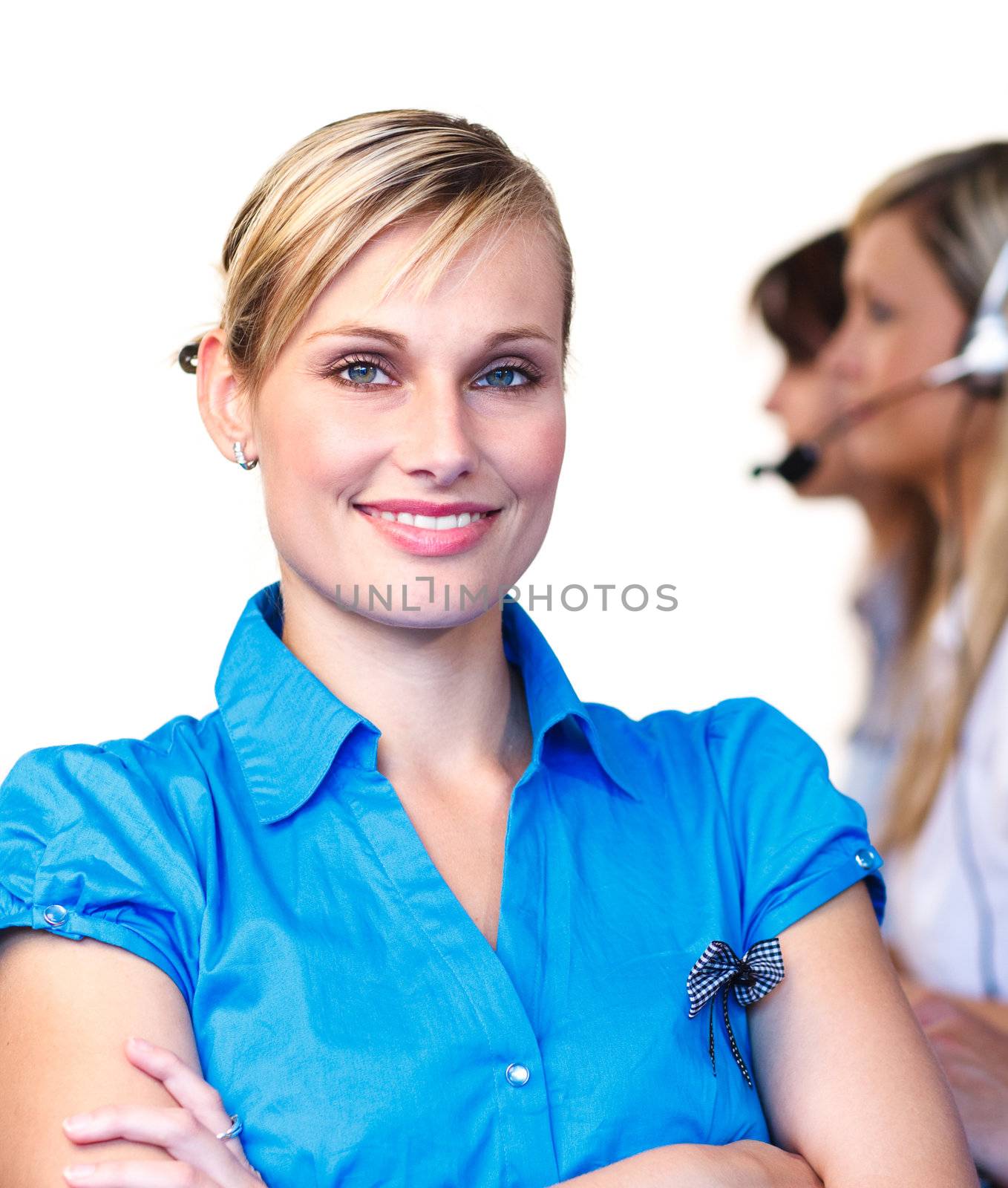 Beautiful businesswoman in a call center  by Wavebreakmedia