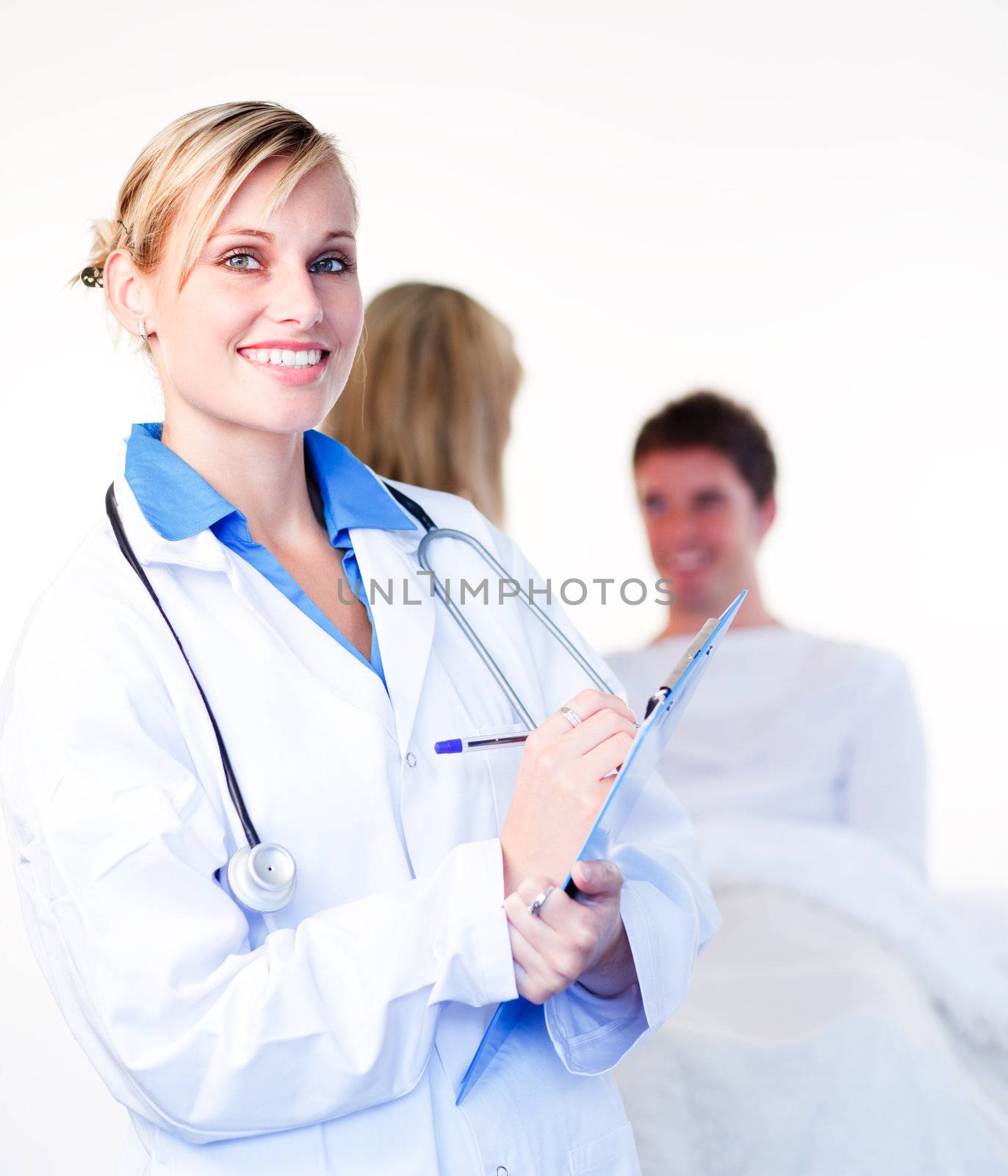 Doctors attending to a patient in hospital