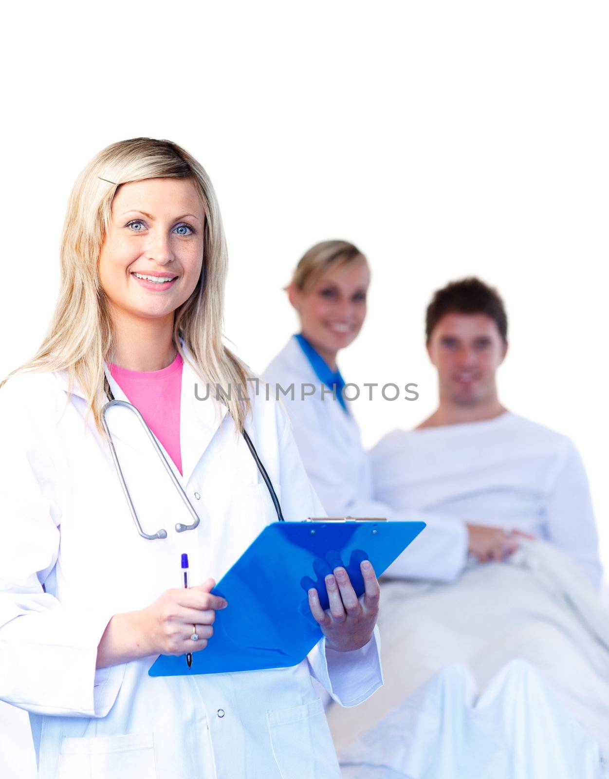 Beautiful young doctors with a patient in the background