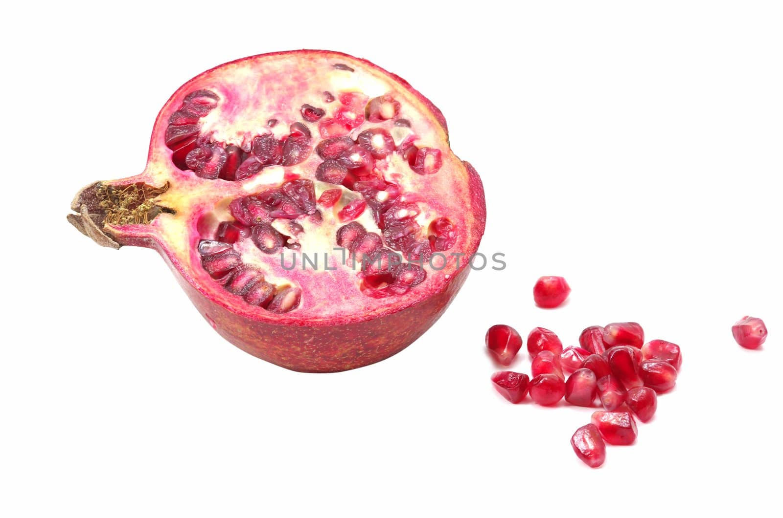 Cutted pomegranate with seeds