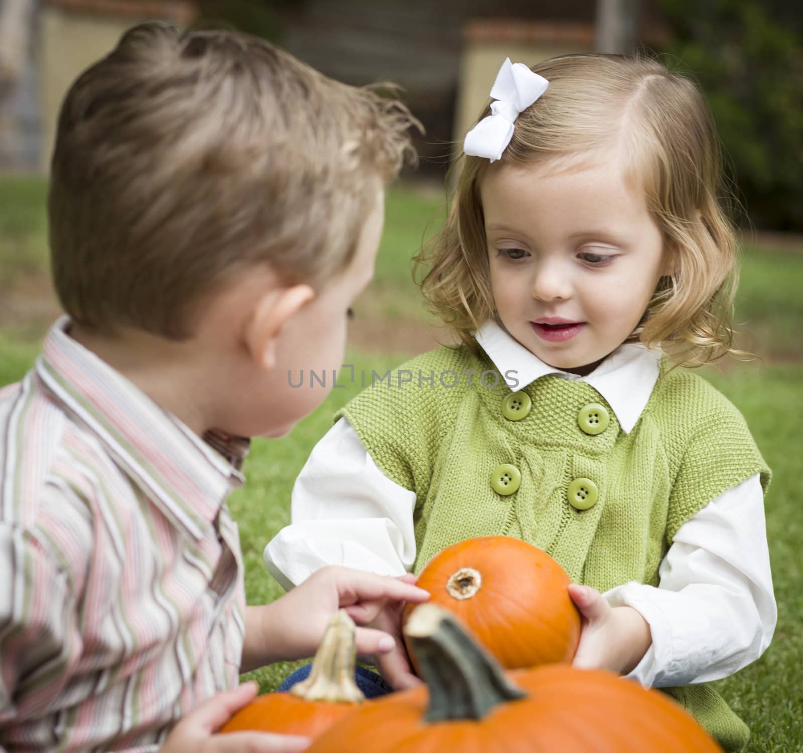 Cute Young Brother and Sister At the Pumpkin Patch by Feverpitched