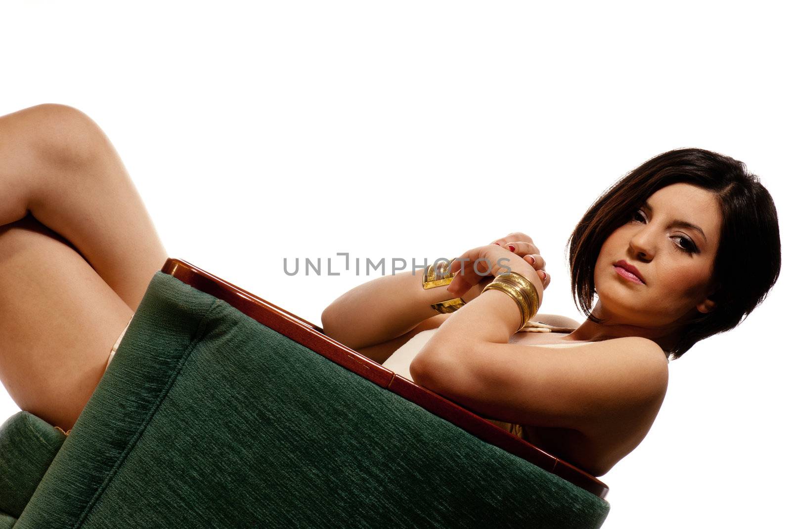 A lady in a green chair isolated on white