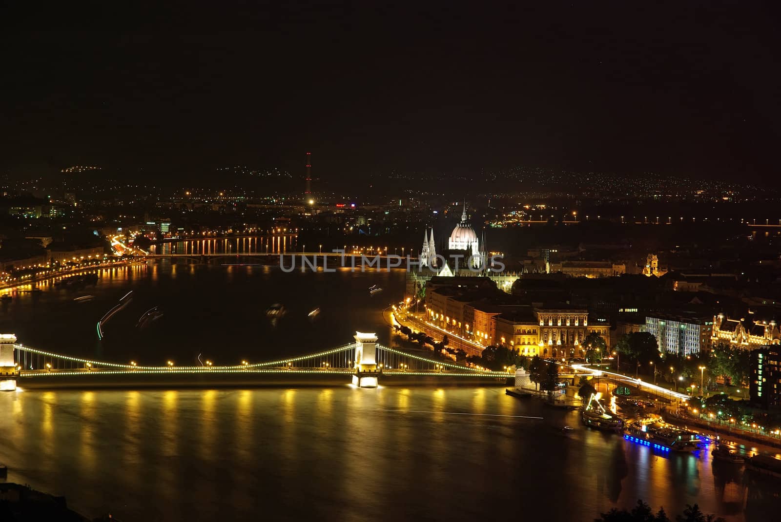 Night view in Budapest: Danube river, Chain bridge and Parliament