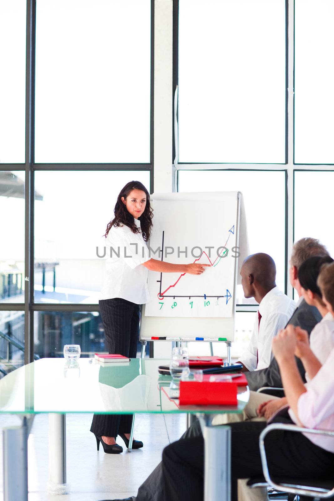 Confident businesswoman after giving a presentation