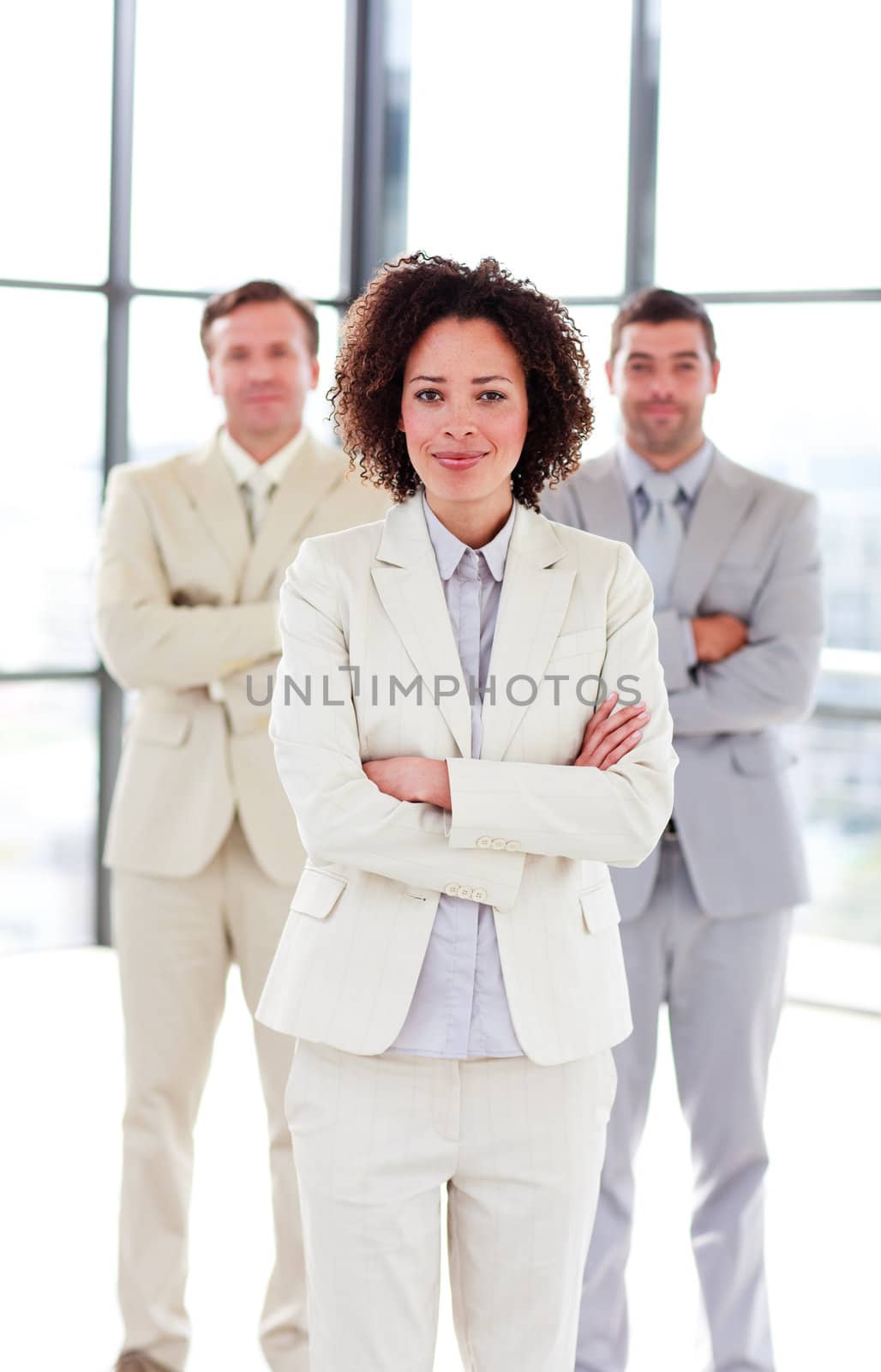 Attractive businesswoman with folded arms by Wavebreakmedia