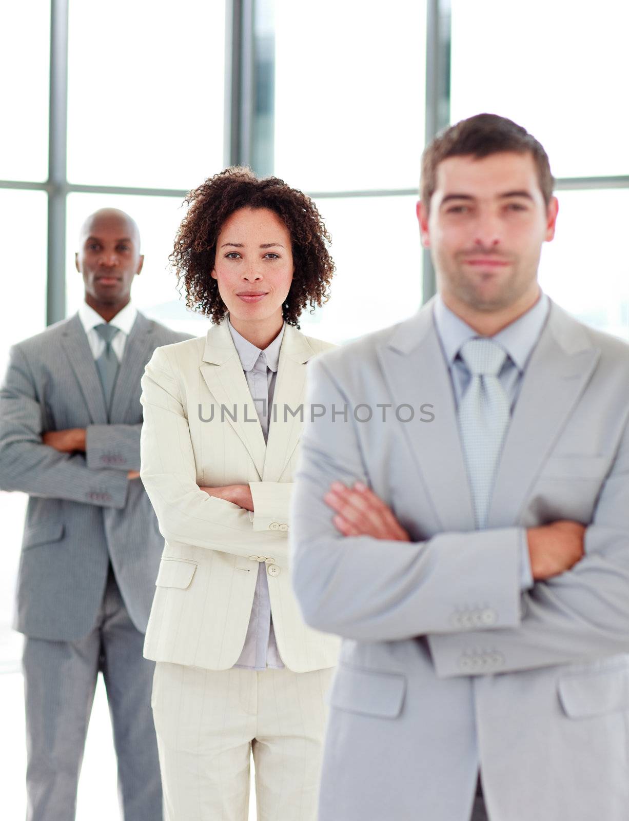 Confident African-American businesswoman with folded arms