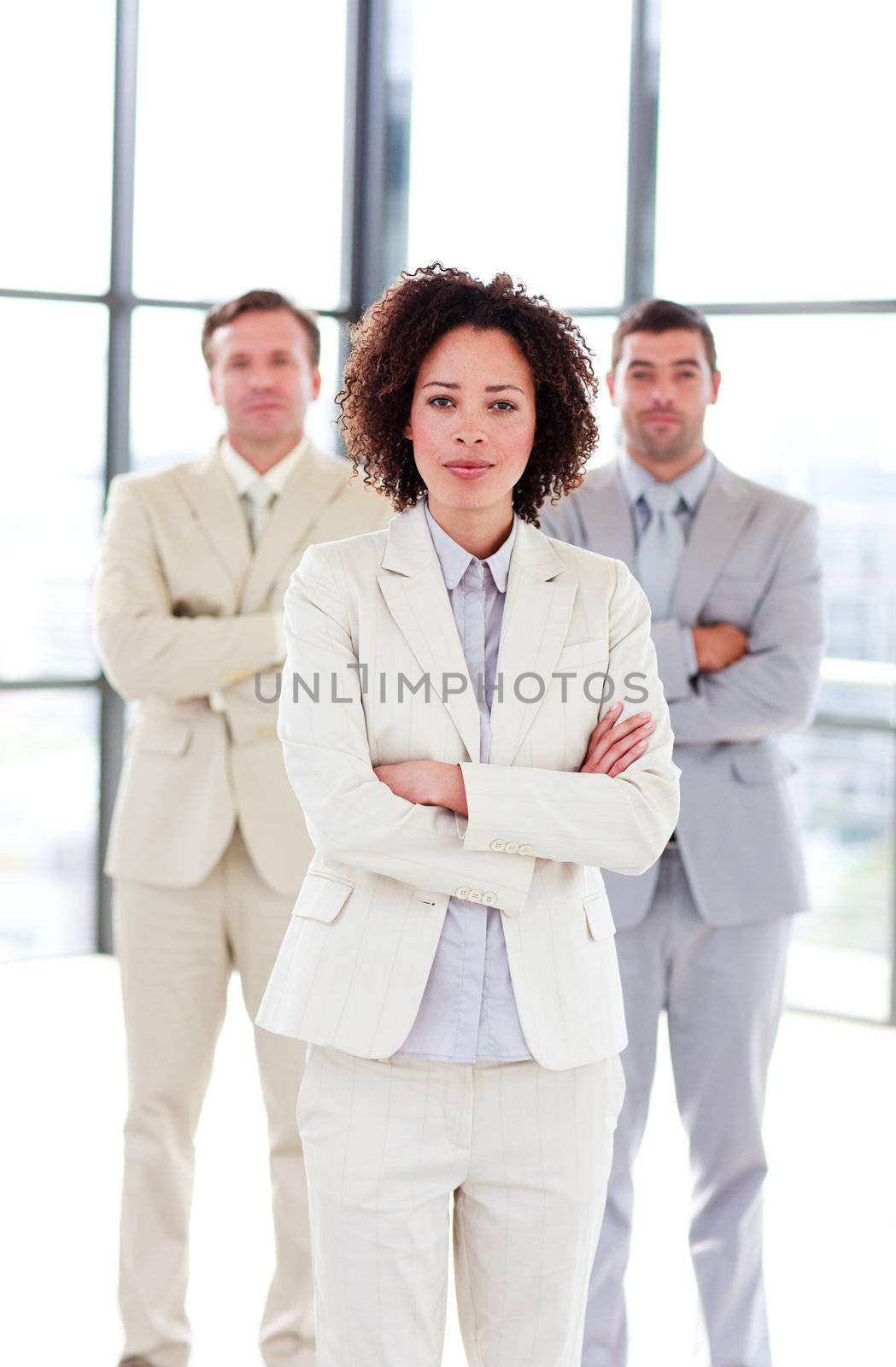 Serious businesswoman with folded arms by Wavebreakmedia