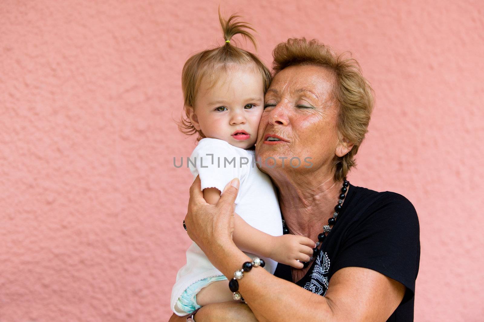Grandmother loves her grandkid while showing her true feelings.