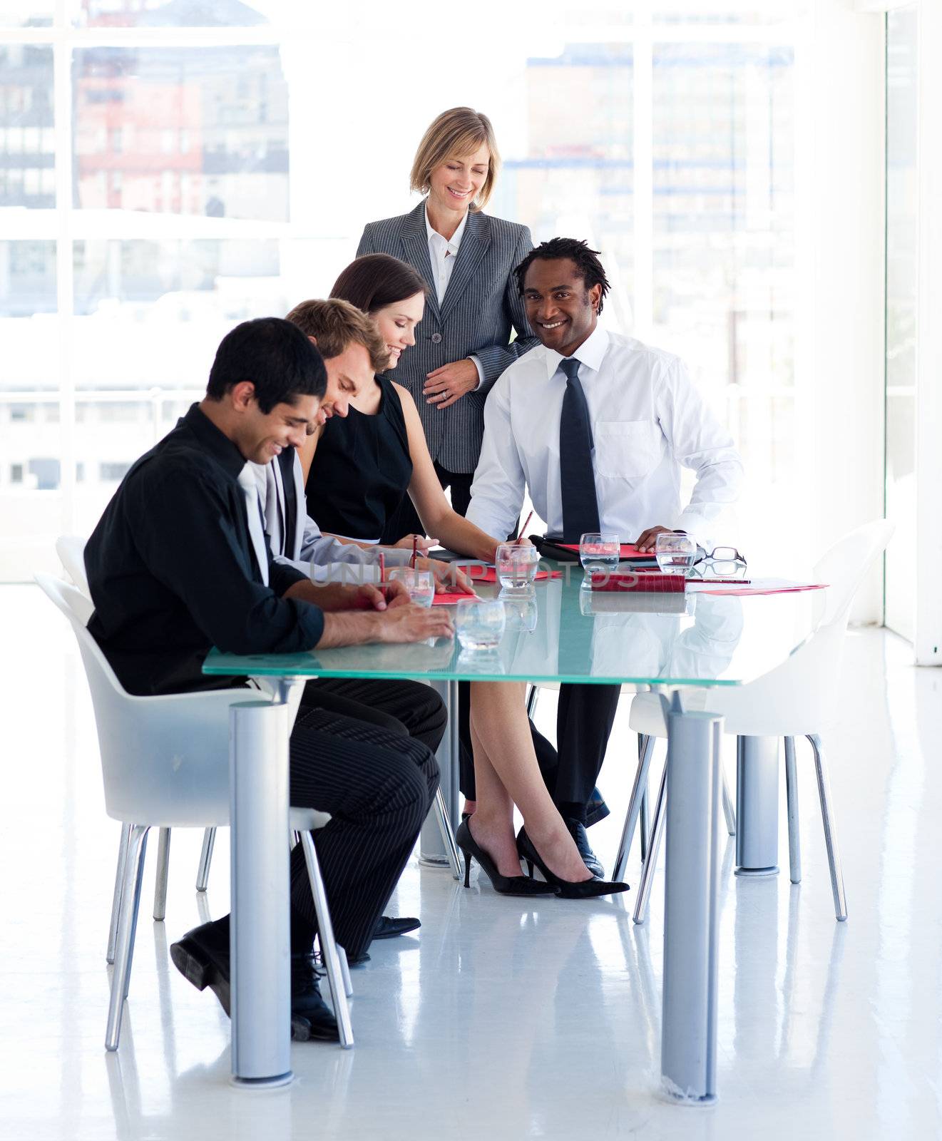 Female manager with her team in office by Wavebreakmedia