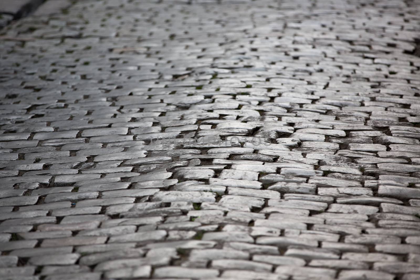 Old pavements are done by chisel cut rocks.