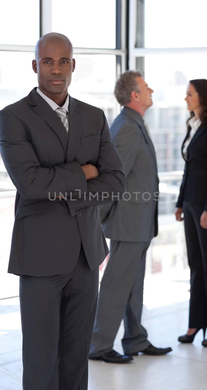 Multi-ethnic Businessgroup looking at camera 