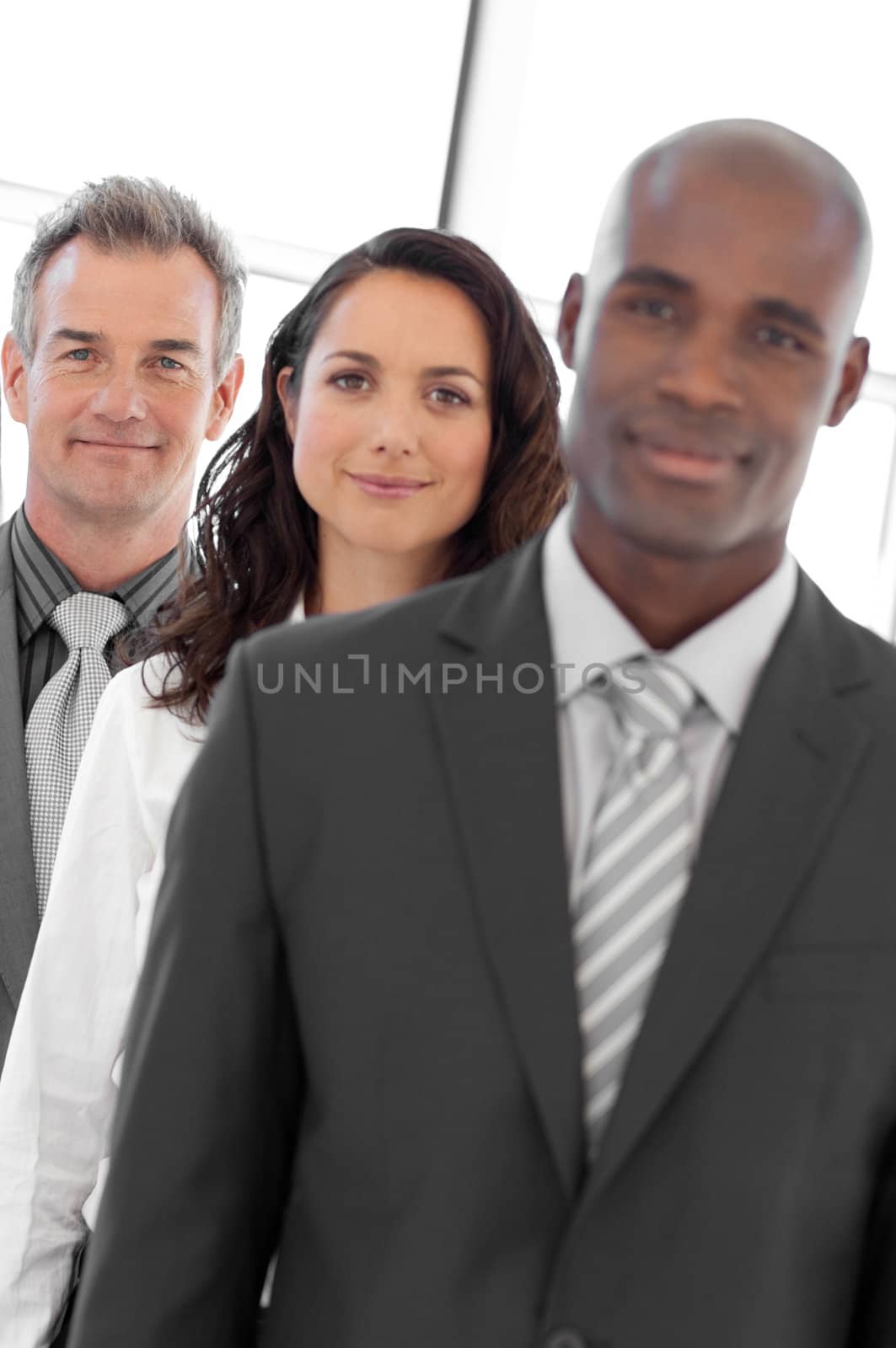 Multi-ethnic Businessgroup looking at camera 