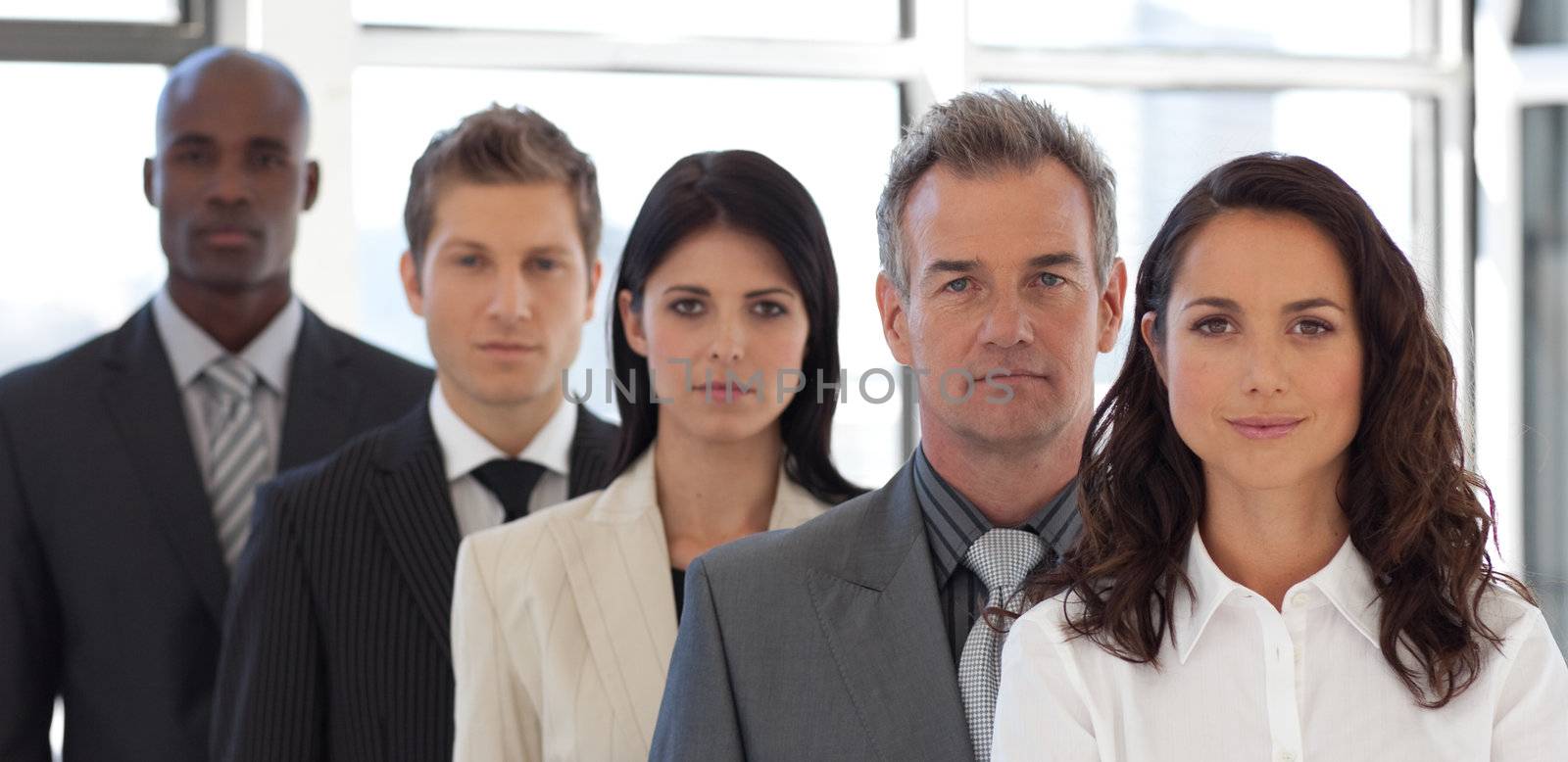 Multi Ethnic Businessgroup looking at Camera