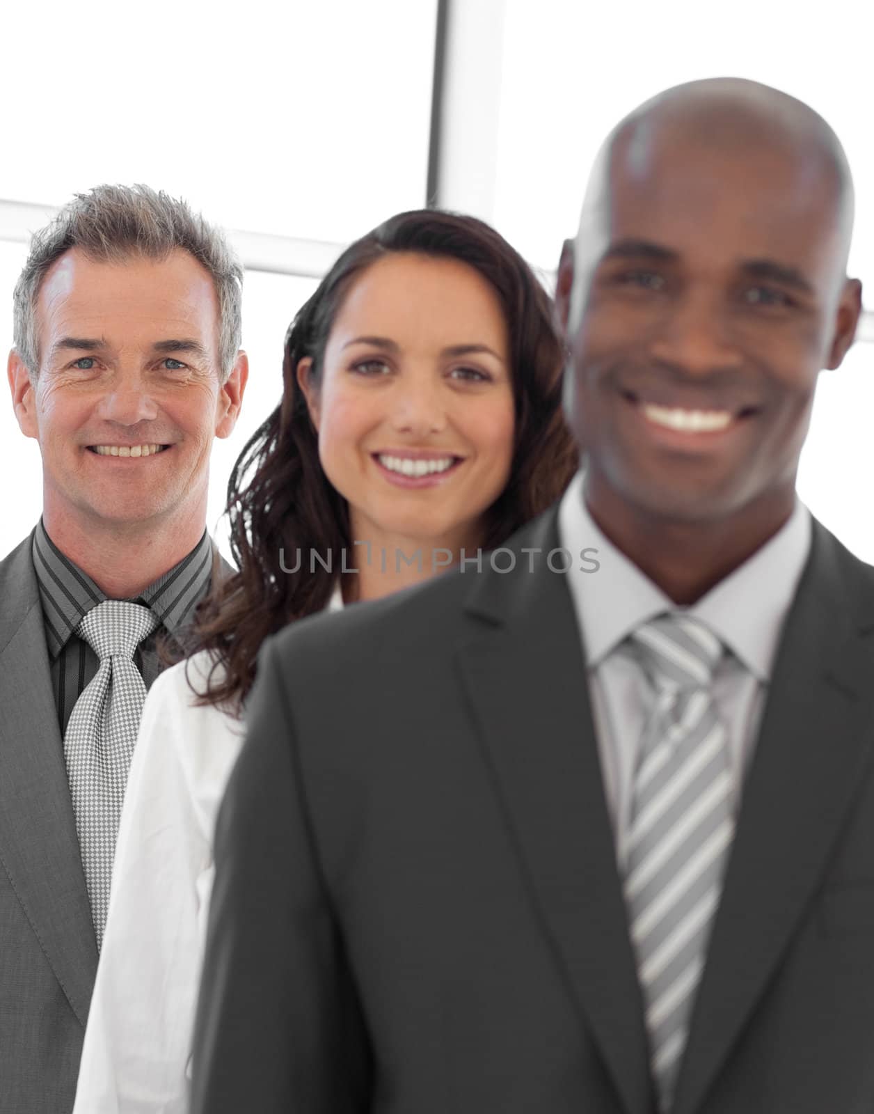 Multi-ethnic Businessgroup looking at camera 