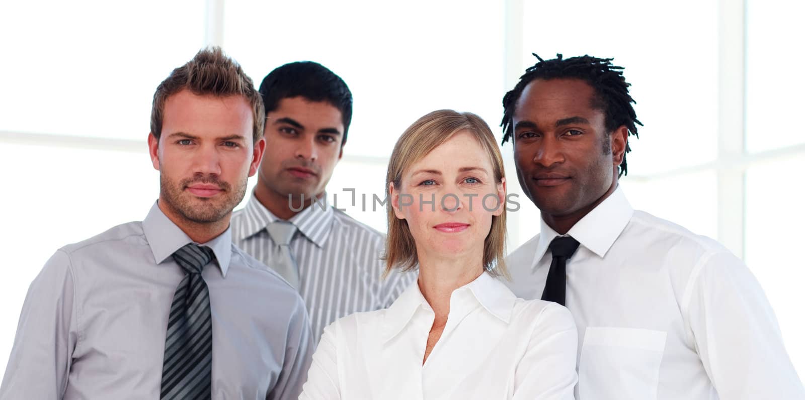 Portrait of an international serious business team looking at the camera