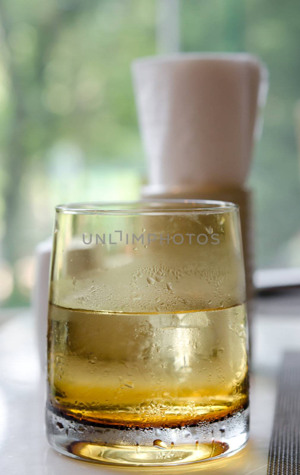 glass of cold water on a  table