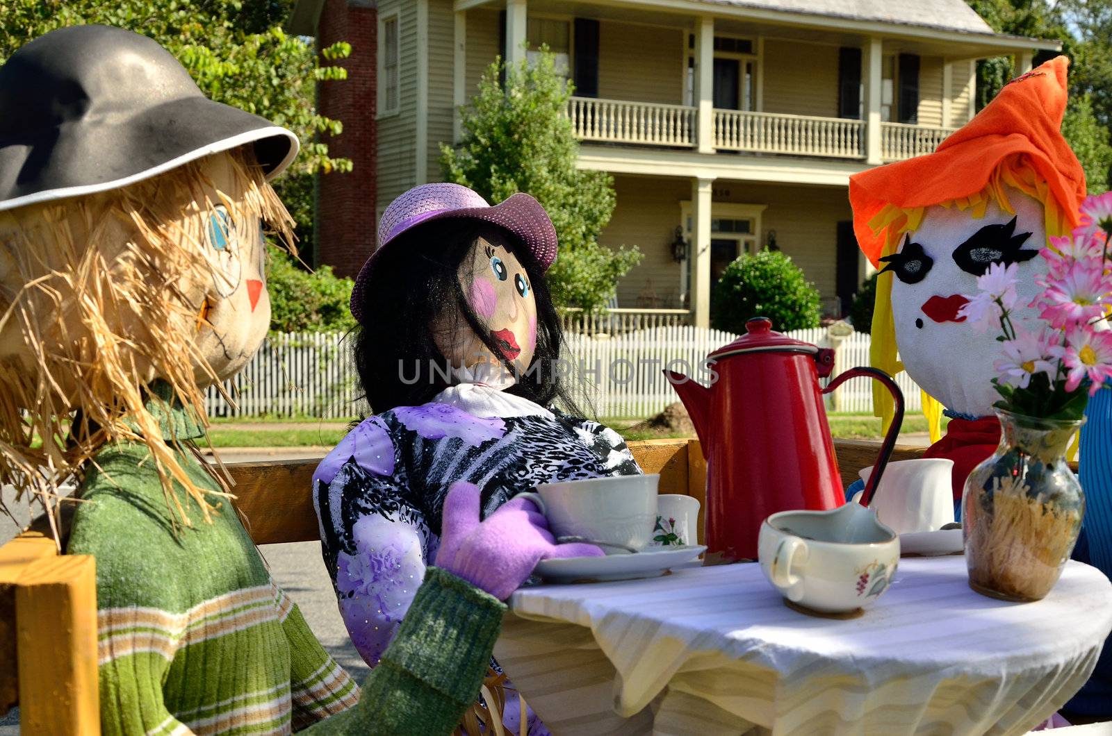 A tea party of scarecrows can be seen along Osborne Street in Saint Marys Georgia