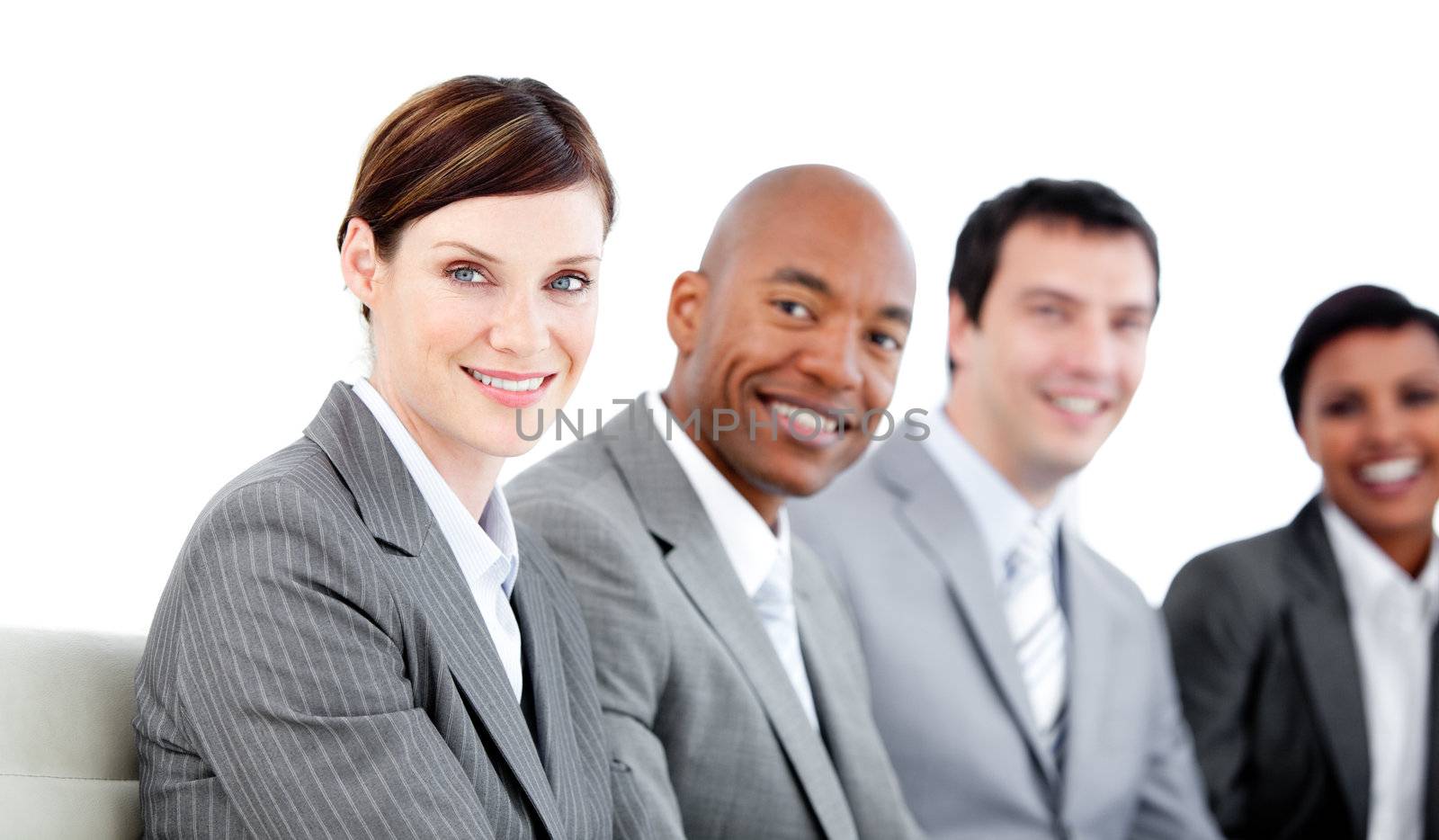 Portrait of smiling business team during a presentation against a white background