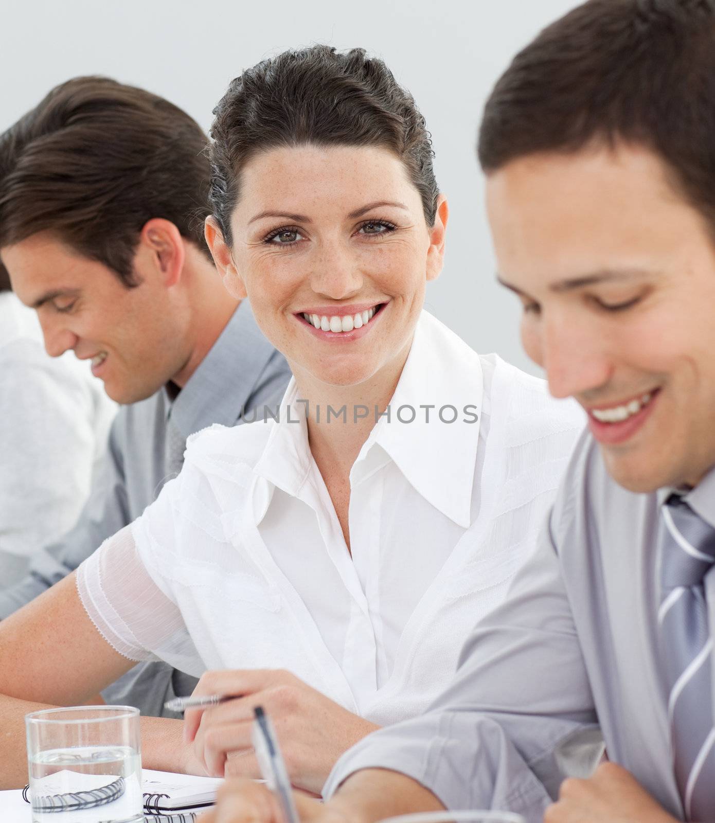 Attractive businesswoman in a meeting with her team  by Wavebreakmedia