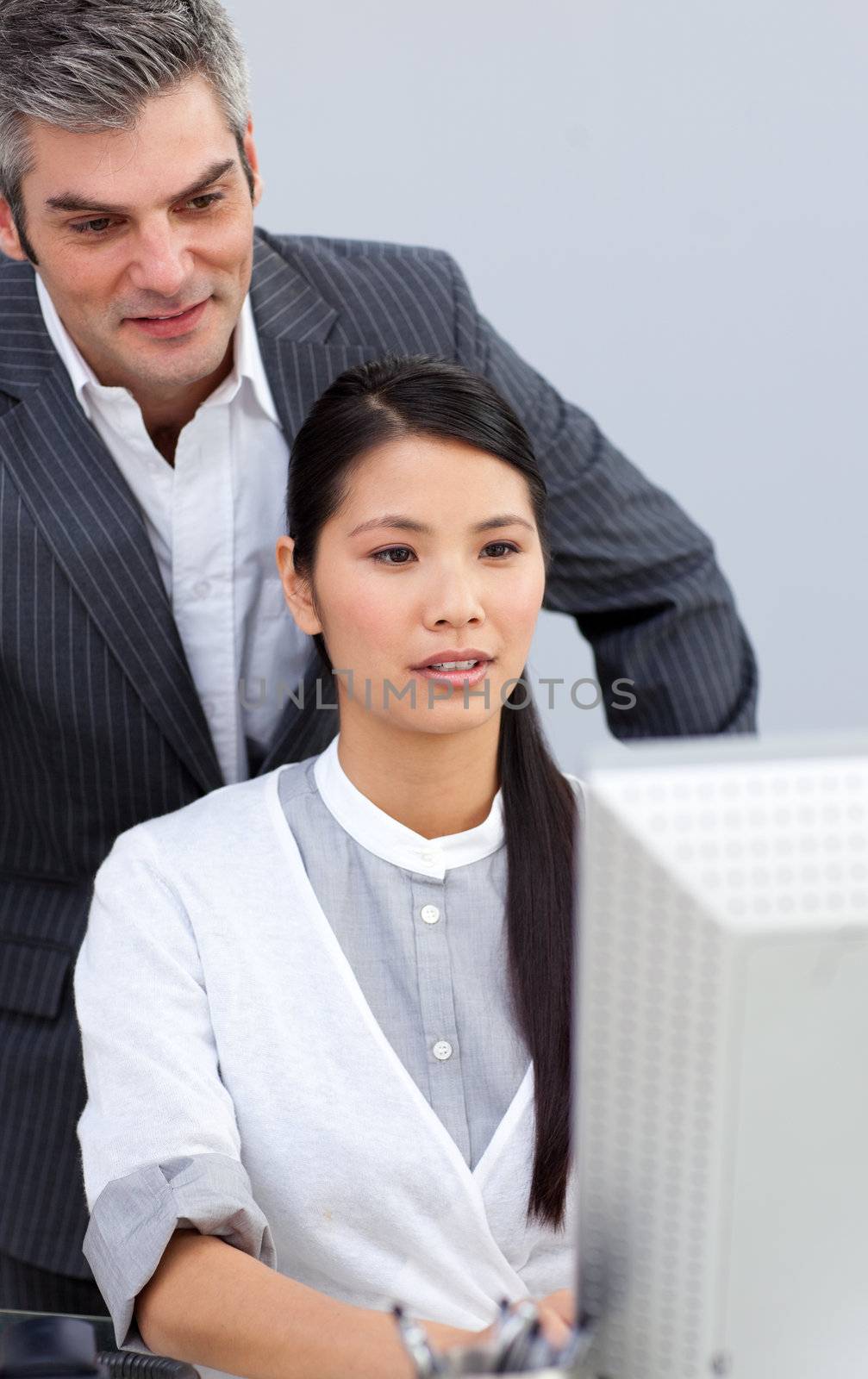 Asian businesswoman helping by her manager in the office