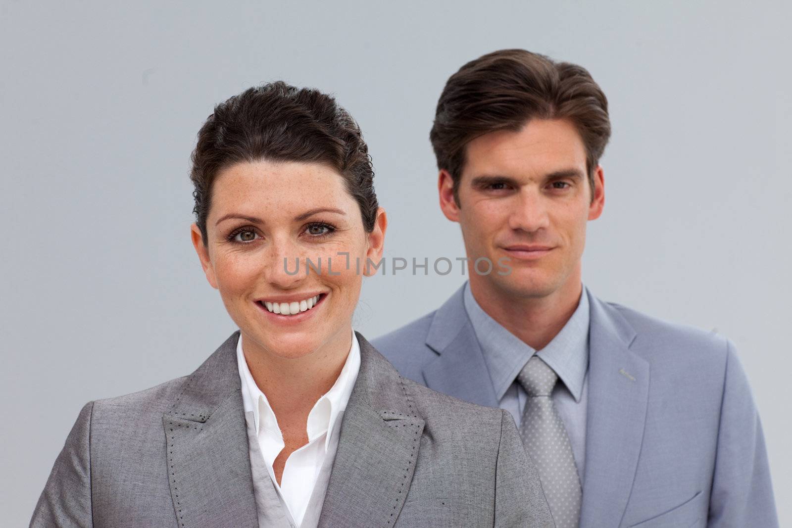 Smiling Business people in a line by Wavebreakmedia