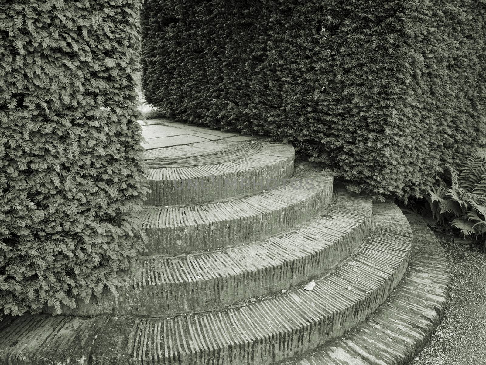 In an English country garden. British garden architecture from the Cotswold area. Monochrome.